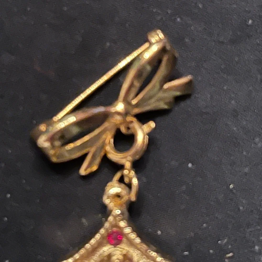 Vintage Gold Tone Bow and Birdhouse Brooch with Red Rhinestone Pendant